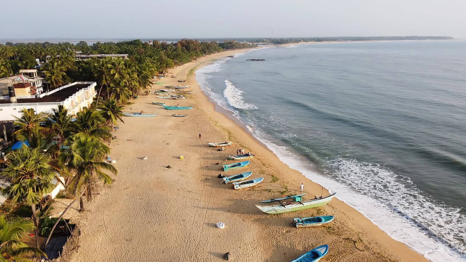 The sandy coastline of Arugam Bay